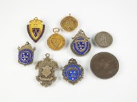 Lot 546 - Three 9ct gold Shropshire Football medals,...
