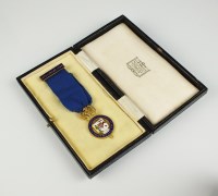 Lot 549 - A 9ct gold and polychrome enamel Masonic medal...