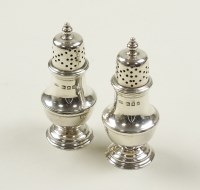 Lot 14 - A pair of silver pepperettes, Thomas Edward...