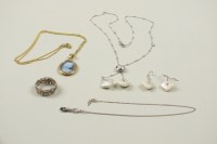 Lot 17 - A diamond and square baroque cultured pearl...