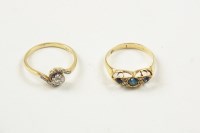 Lot 22 - An 18ct gold seven stone blue stone and...