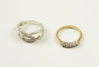 Lot 28 - A 9ct yellow gold diamond ring, comprising...