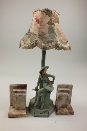 Lot 45 - An Art Deco painted metal and composite...