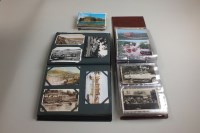 Lot 69 - Postcards, contained within albums, British...