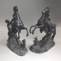 Lot 81 - A pair of bronze patinated spelter Marly...