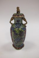 Lot 93 - A Chinese blue and white 'clobbered' vase Qing...