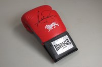 Lot 100 - A 14oz non-match play Lonsdale boxing glove...