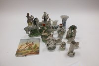 Lot 104 - Staffordshire figures to include two zebras,...