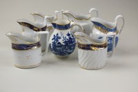 Lot 141 - Coalport and Worcester cream jugs, early 19th...