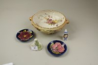 Lot 169 - Two Royal Worcester porcelain candle snuffers...