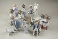 Lot 194 - A collection of Lladro porcelain figures of...