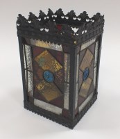 Lot 292 - A 20th century cast metal and stained glass...