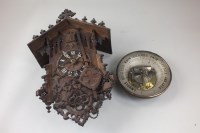 Lot 322 - An Austrian oak cased cuckoo clock with...