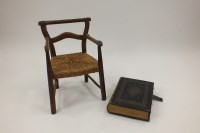 Lot 345 - A 19th century child's oak rush seated chair...