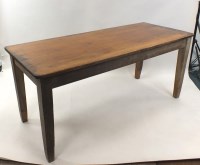 Lot 353 - A pine kitchen table the rectangular planked...