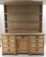 Lot 367 - An early 20th century pine dresser and rack,...