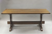 Lot 387 - An oak refectory style dining table the...