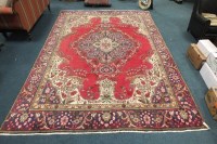 Lot 394 - Old red ground Persian Tabriz carpet...