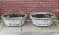 Lot 419 - A pair of composite stone troughs after the...