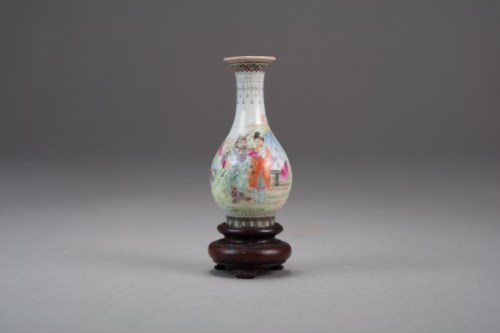 Lot 31 - A miniature Chinese famille rose bottle vase...