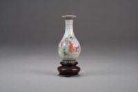 Lot 31 - A miniature Chinese famille rose bottle vase...