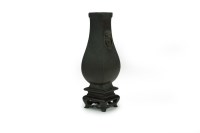 Lot 50 - A small Chinese bronze vase, Hu Qing Dynasty...