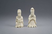 Lot 58 - A pair of Chinese carved ivory snuff bottles...