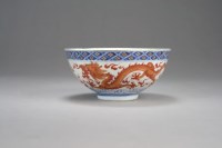 Lot 77 - A Chinese blue and white and iron red...