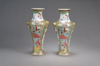 Lot 135 - A pair of Chinese Canton famille rose baluster...