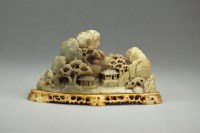 Lot 172 - A Chinese soapstone boulder carving Xuande...