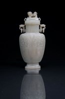 Lot 173 - A Chinese celadon jade archaistic vase and...