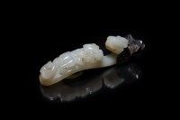Lot 174 - A Chinese silver mounted pale celadon jade...