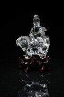 Lot 180 - A Chinese carved rock crystal figure of a...