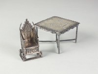 Lot 153 - A continental silver miniature table, Isaac...