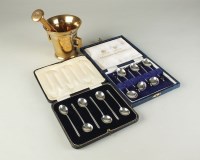 Lot 183 - A cased set of silver coffee spoons with...