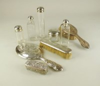 Lot 189 - A set of six silver topped glass dressing...