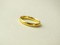 Lot 218 - A 22ct gold plain polished wedding band,...