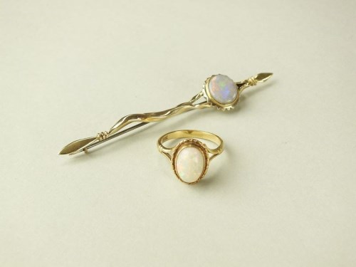 Lot 224 - A 9ct gold opal pin brooch, by Tom McEwan,...