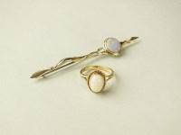 Lot 224 - A 9ct gold opal pin brooch, by Tom McEwan,...