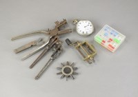 Lot 234 - A collection of watchmakers tools, watch cases...