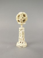 Lot 301 - A Chinese Canton carved ivory puzzle ball on...