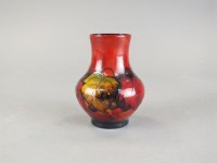 Lot 339 - A small Moorcroft red flambe vase in the Leaf...