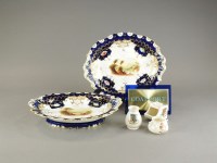 Lot 349 - A pair of Coalport blue and gilt landscape...