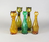 Lot 366 - Five glass decanters and covers modelled as...