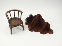 Lot 528 - A child's elm seat stick back chair with...