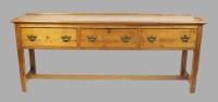 Lot 540 - An early 20th century pine dresser base, the...