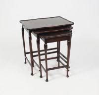 Lot 544 - A nest of three mahogany veneered graduated...