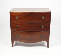 Lot 575 - An early 19th century mahogany bowfront chest...