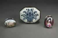 Lot 11 - Two English oval enamel pill boxes, 19th...