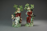Lot 14 - A pair of Staffordshire pearlware figures,...